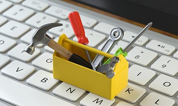 small toolbox on a laptop keyboard